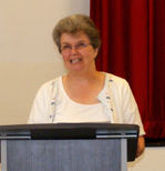 Woman addressing a congregation